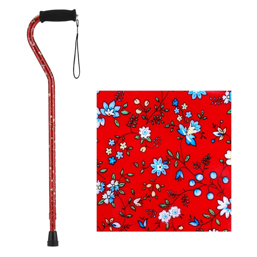 The Nova Designer Offset Walking Cane features a red floral pattern with blue, white, and pink flowers, plus a black handle and wrist strap—an ideal choice for anyone seeking a stylish and functional walking cane.